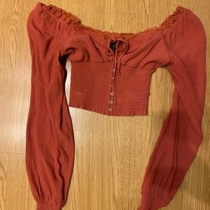Boho rust orange top. Super cute.